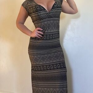 Elegant Black and Cream Patterned Dress
